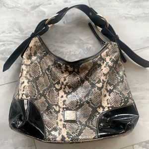 Dooney & Bourke patent and snake pattern handbag